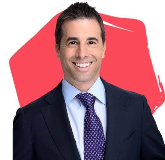 Rob Rubano, Board Director, in front of a red hexagon.